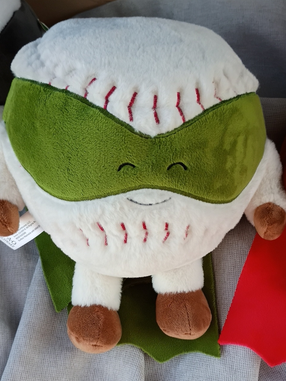 FAO Schwarz Green-Masked Plush Baseball Superhero Toy